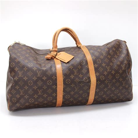 lv duffle bag black with red|authentic louis vuitton duffle bag.